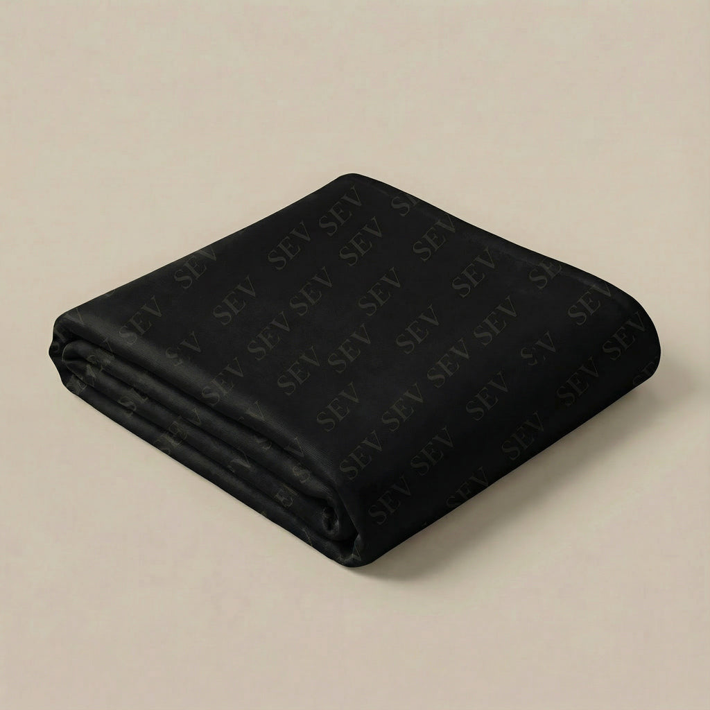 SEV Wordmark Repeat Throw Blanket — Noir Graphite — alternate view 4 of 5