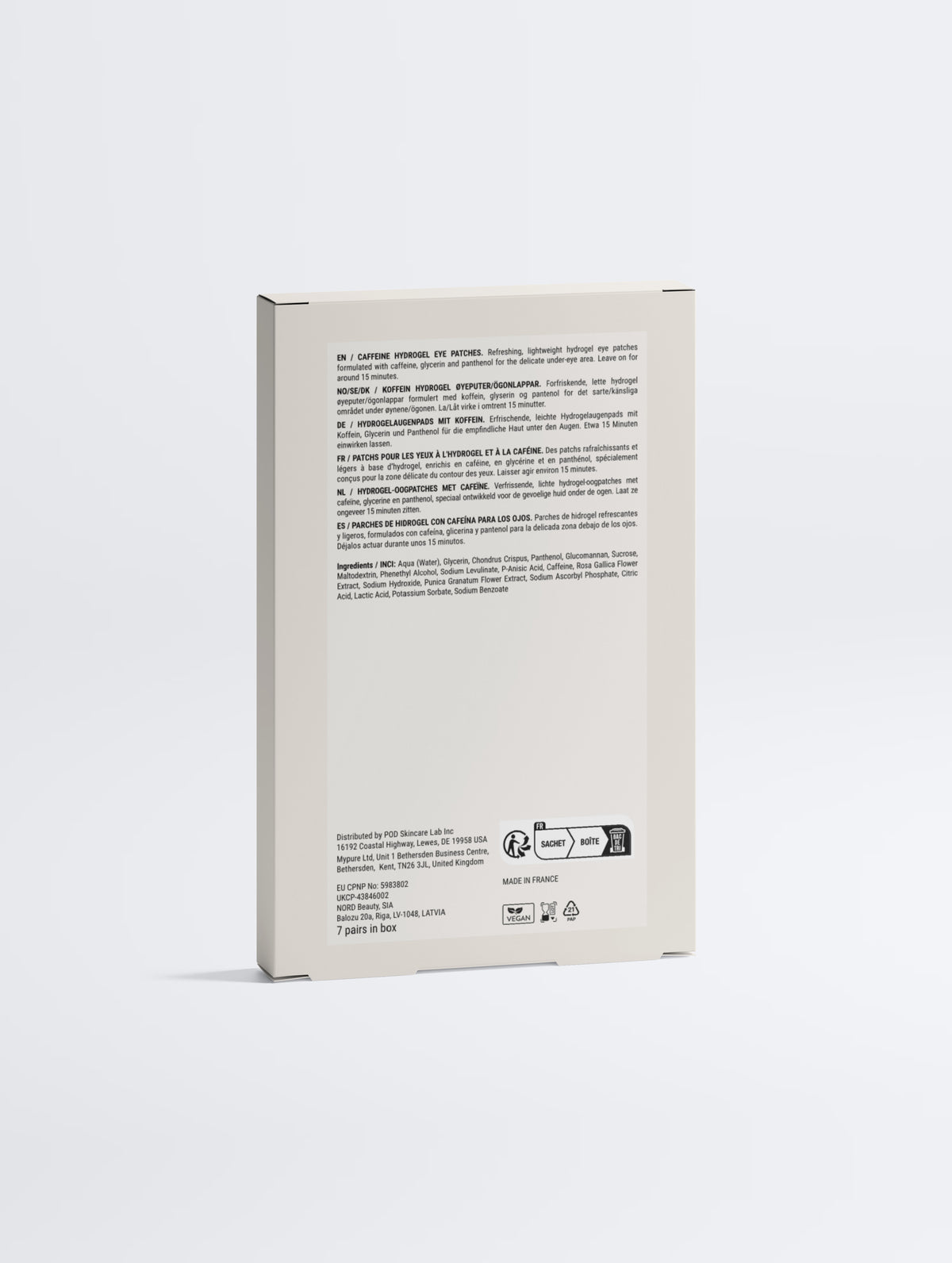 Caffeine + Vit C Hydrogel Eye Patches — back of the box showing the multilingual ingredient and compliance panel, The Face Composition.