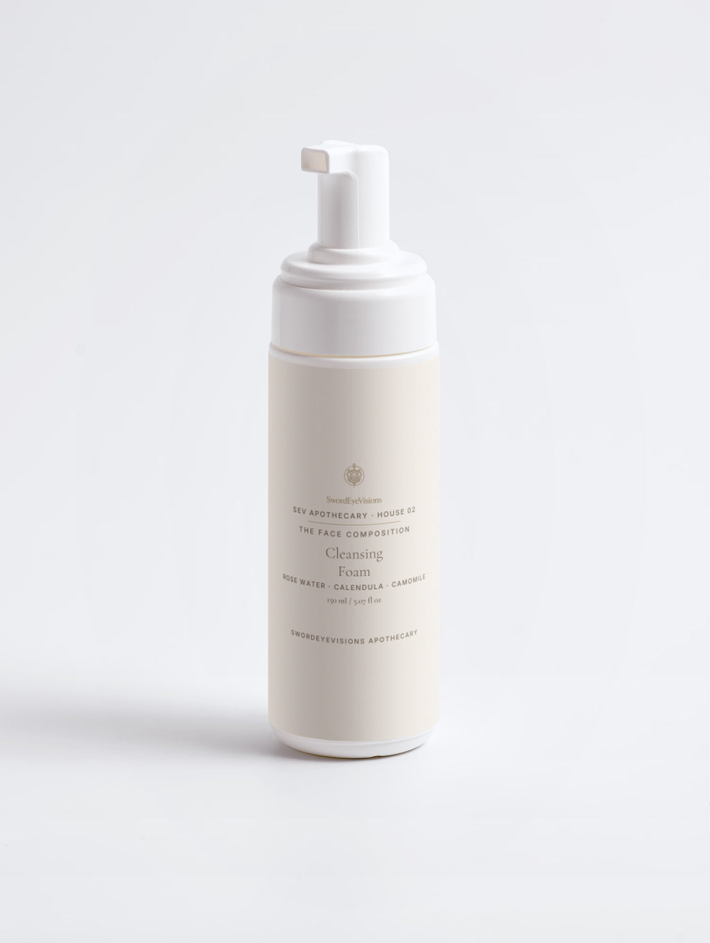 Cleansing Foam — 150 ml SEV Apothecary foam pump bottle with a cream label, front view showing the SwordEyeVisions sigil above The Face Composition, on a plain studio background.