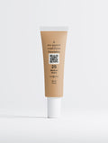 SEV Makeup Foundation with Peptides in shade 25 Medium Warm: a 30 ml squeeze tube tinted to the medium warm shade with a white cap, carrying the Complexion ten-position shade index and a QR code on a light tile.