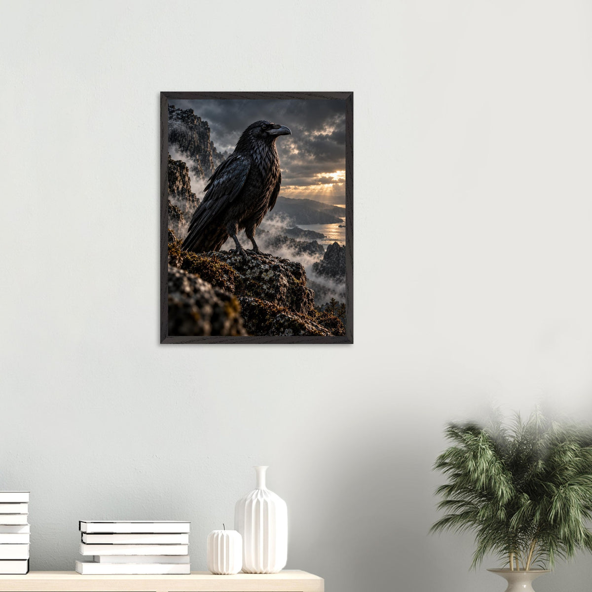 Raven framed art print, 45 × 60 cm, on a wall above a shelf