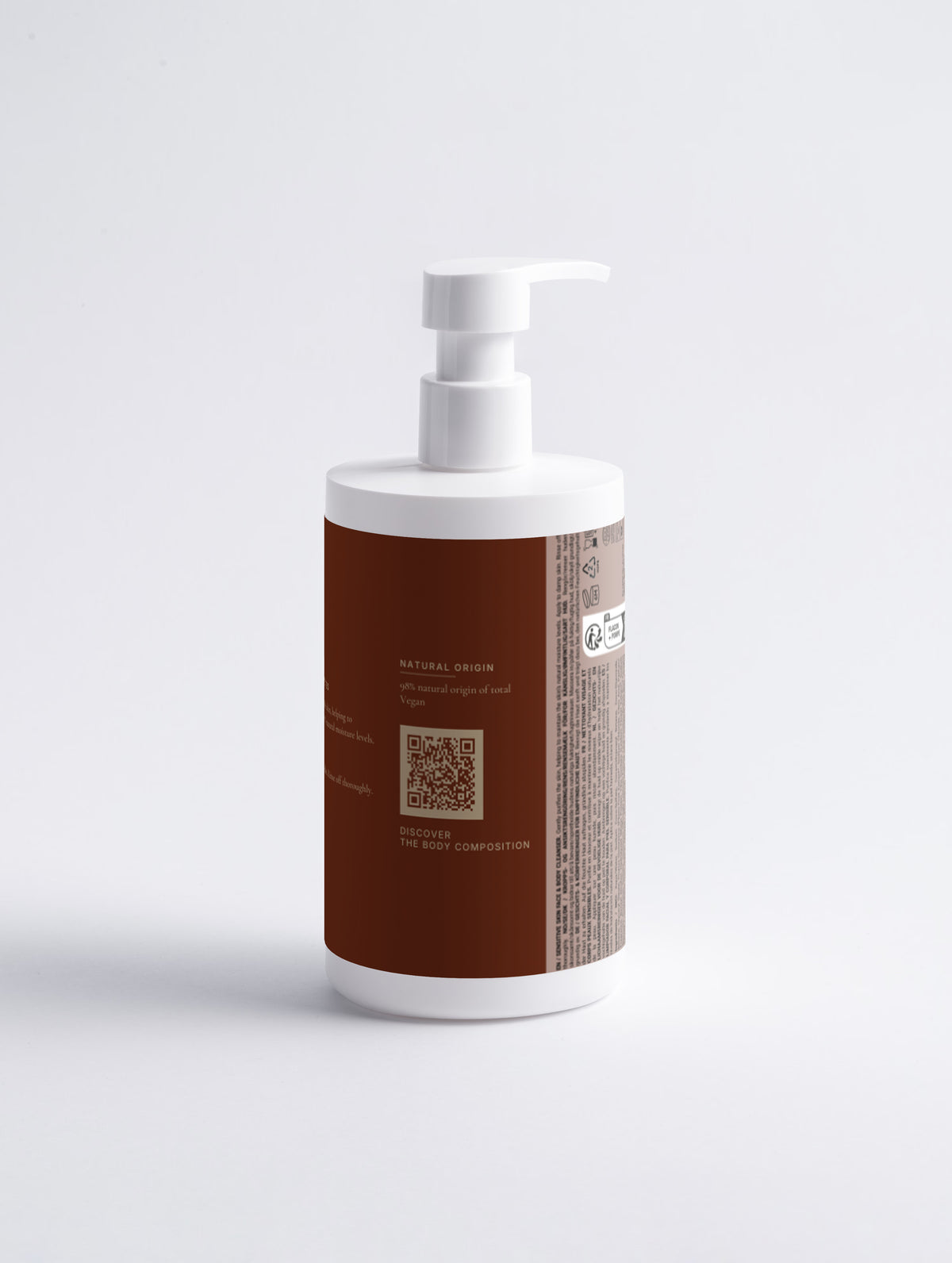 The same bottle rotated to show the natural origin panel with the Body Composition QR code and the printed multilingual regulatory panel.