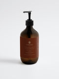 Hand & Body Wash, Grapefruit — 490 ml SEV Apothecary amber pump bottle, The Body Composition, on a plain studio background.