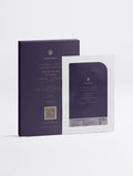 Anti-Age Hydrogel Eye Patches — SEV Apothecary box of 7 pairs in deep aubergine standing behind a single foil sachet, The Recovery Composition, on a plain studio background.