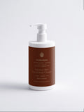 Sensitive Skin Face & Body Cleanser — 390 ml SEV Apothecary bottle with a white pump and a deep russet label, front view showing the SwordEyeVisions sigil above The Body Composition.